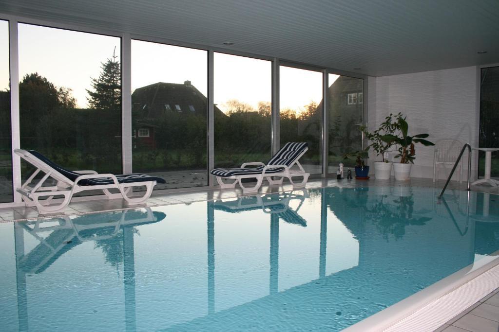 Ferienwohnungen Im Hotel Garni Zur Post Utersum Kamer foto